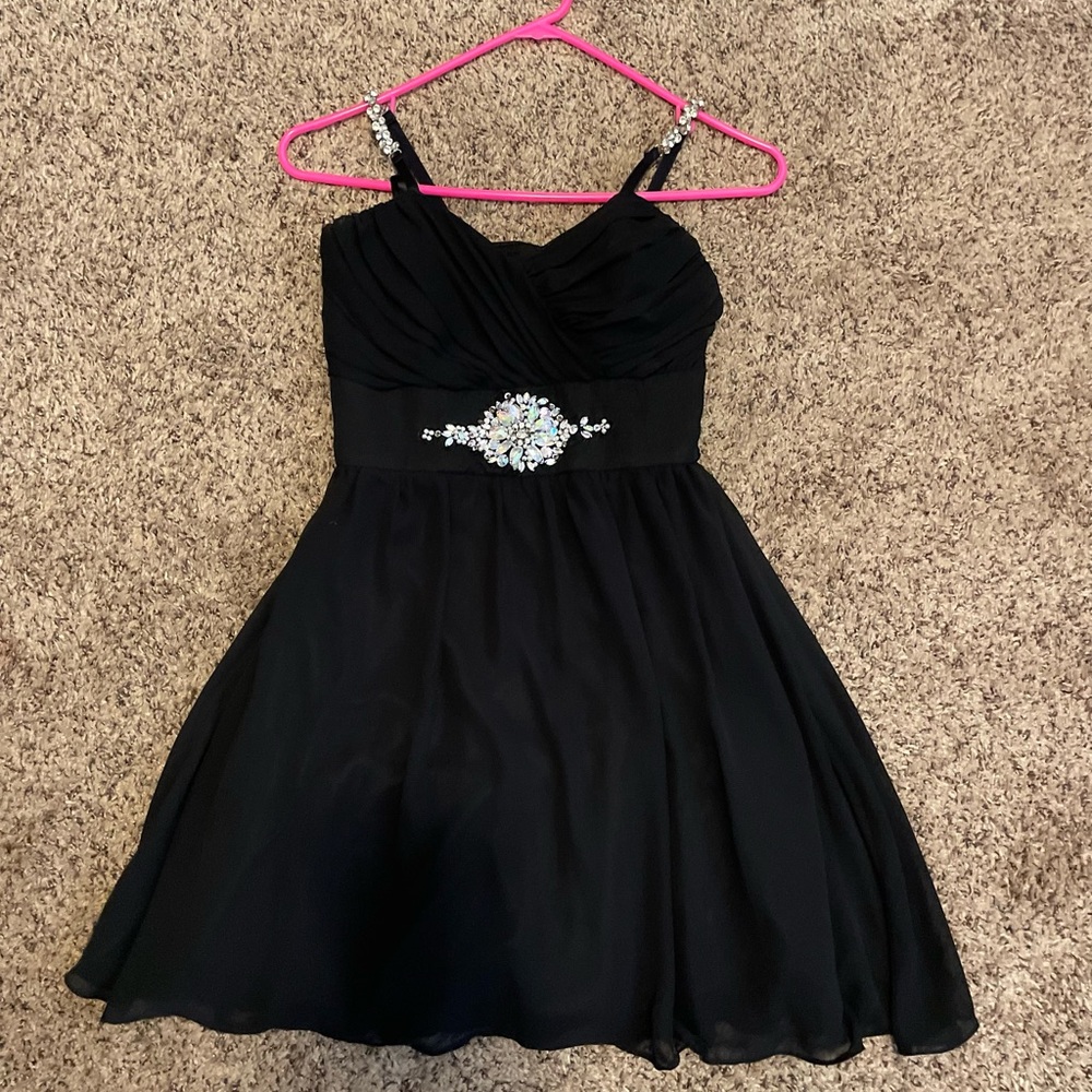 adorable black semi formal dress with rhinestone straps and centerpiece